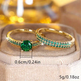 Conjunto de Anéis Duo com Esmeralda em Ouro