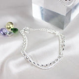 Conjunto de pulseiras elegantes em prata com pedras de zircónio