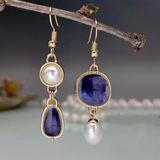 Brincos elegantes com pedra azul e pérola