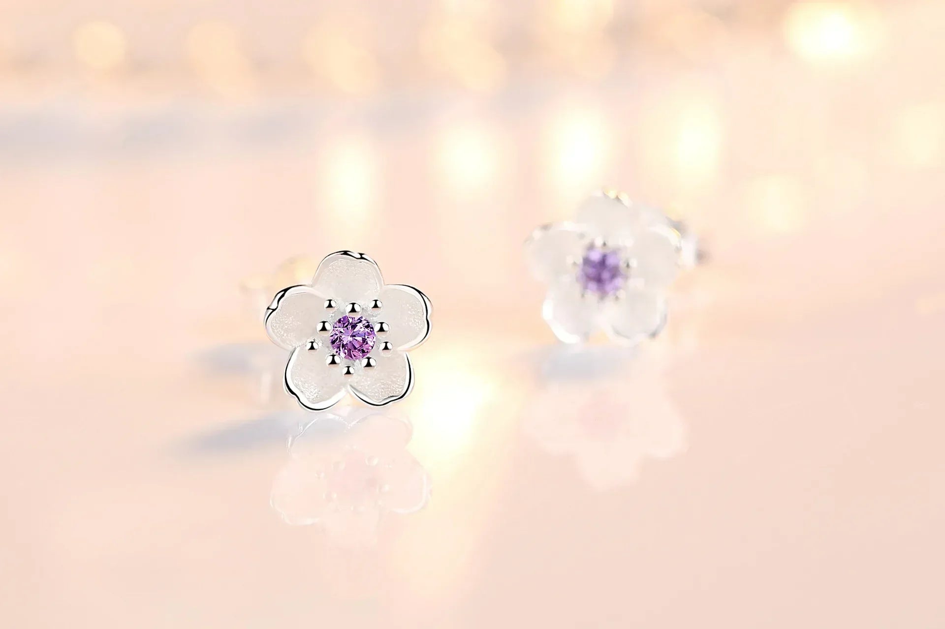Brincos em forma de flor com zirconia