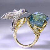 Anel Ajustável em Cor de Água-Marinha com Colibri – Banho de Ouro 14K