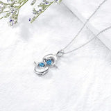 Colar Prateado com Golfinhos Duplos e Cristal Azul