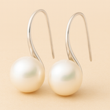 Brincos elegantes em forma de gota com pérolas