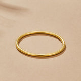 Pulseira rígida dourada Eli