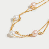 Pulseira em camadas com detalhe delicado