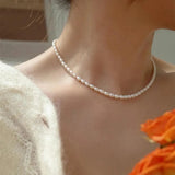 Colar elegante com pérolas