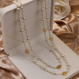 Corrente de ouro elegante com pérolas