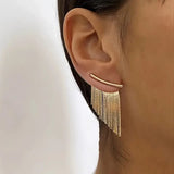 Brincos vintage com pendentes dourados