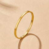 Pulseira rígida dourada Rina