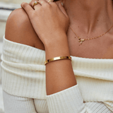 Pulseira rígida dourada Rina