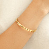 Pulseira rígida dourada Roman