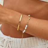 Pulseira rígida dourada Tara