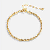 Pulseira dourada torcida