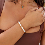 Pulseira rígida dourada Sahara na cor branca
